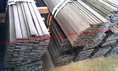 Automatic flat bar serration & cutting machine.